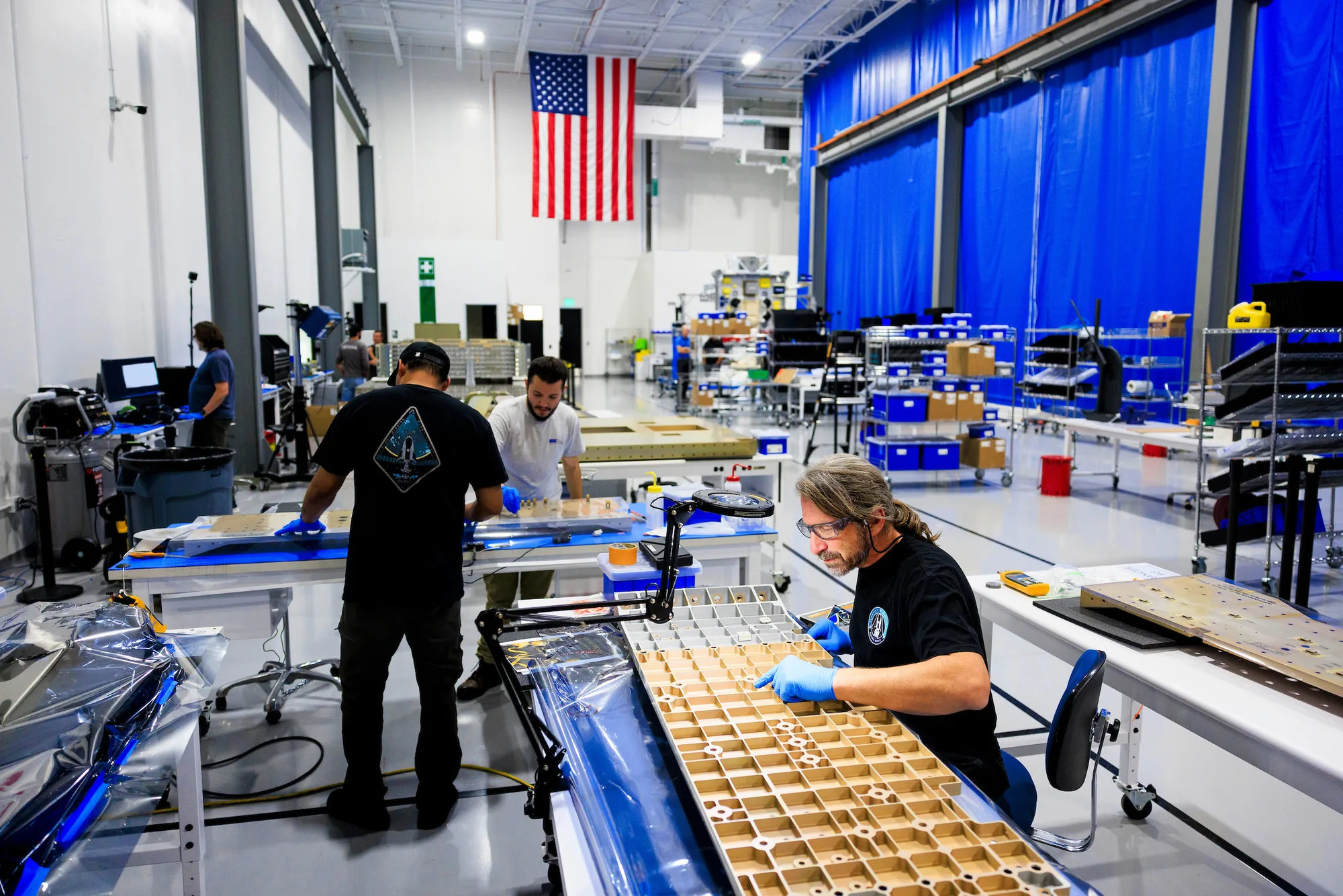 Sierra Space team members working on hardware at Victory Works